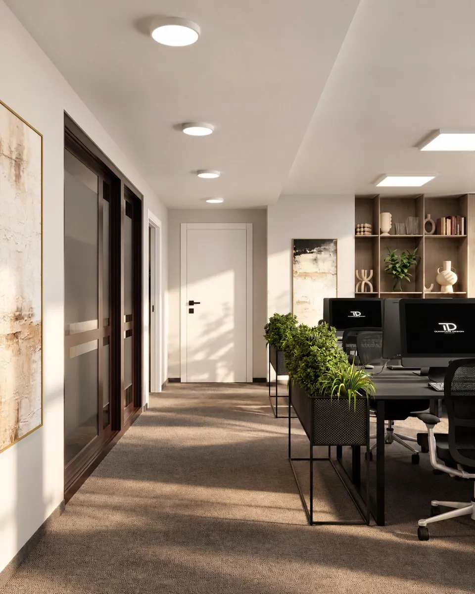 Office corridor with workstations and plants