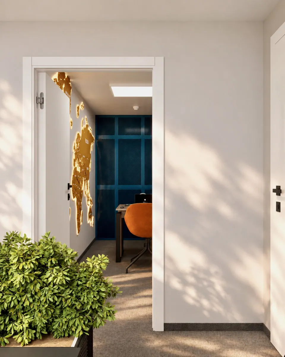 Entrance to an office with a world map on the wall