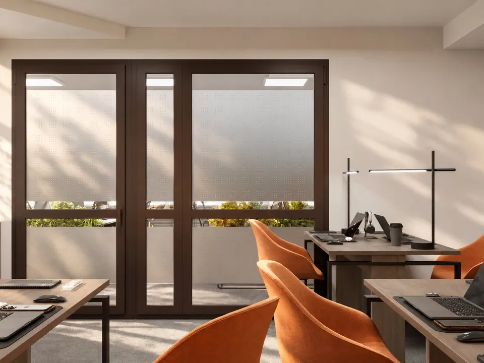 Workstations facing glazed double doors