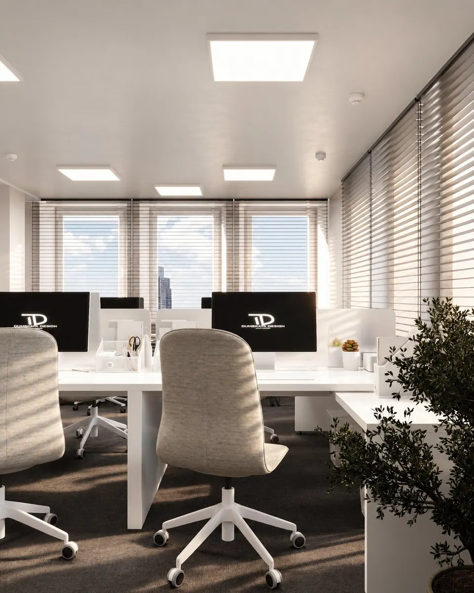 Workstations by panoramic windows with blinds