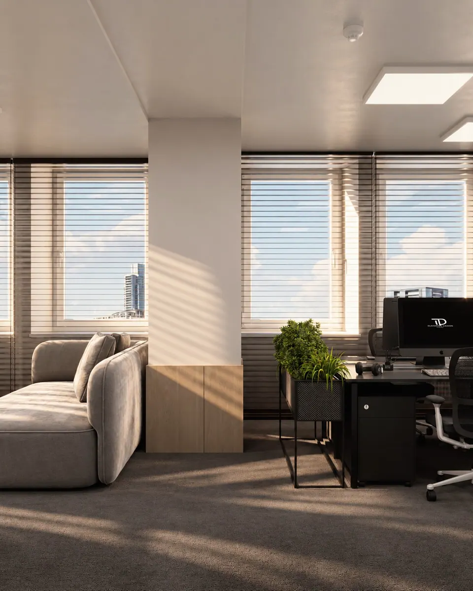 Soft sofa by a column and open-plan desks