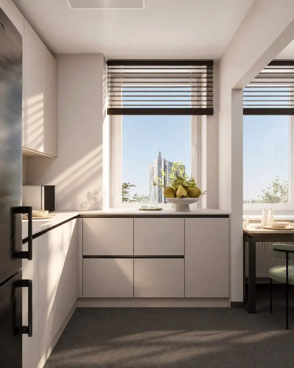 Office kitchen-dining area with an L-shaped kitchen by the window