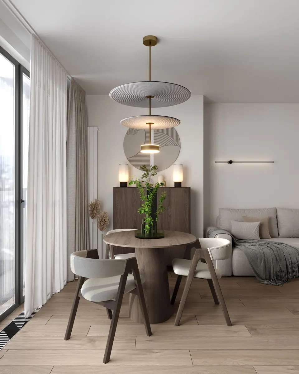 Okrúhly jedálenský stôl pri okne — byt v Eurovea City v Bratislave, 56 m²