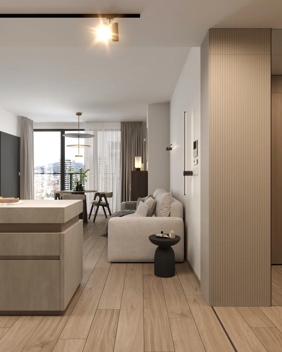 Kuchynský ostrov a pohľad do obývačky — byt v Eurovea City v Bratislave, 56 m²