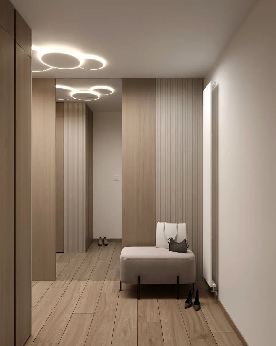 Predsieň so svietidlom zo svetelných kruhov — byt v Eurovea City v Bratislave, 56 m²