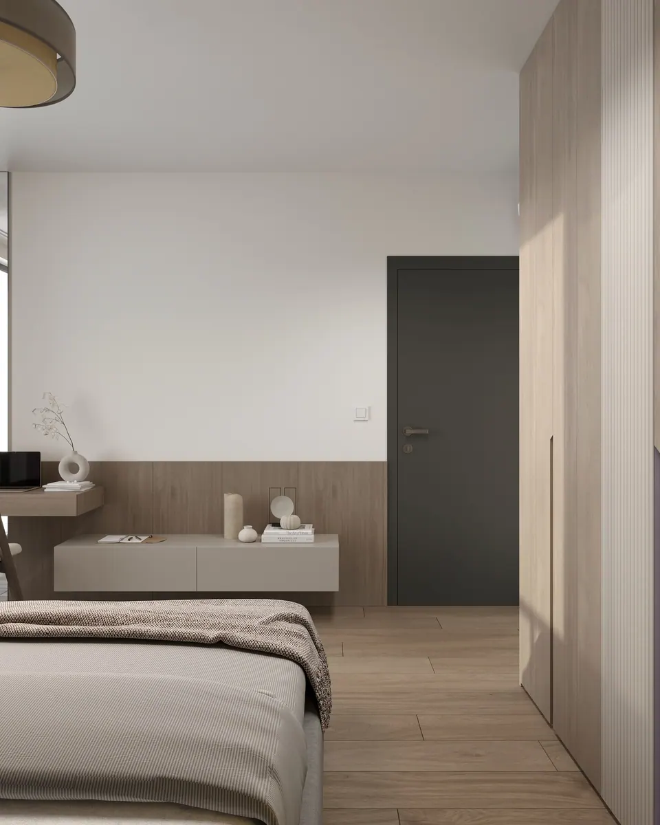 Spálňa so spodnou časťou steny obloženou drevom — byt v Eurovea City v Bratislave, 56 m²